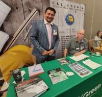 Enrique Rodriguez and Timothy O'Malley at tabletop