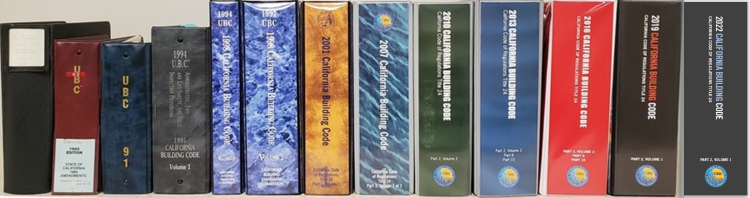 Picture of code book spines 1985 to 2022