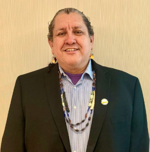 Professional headshot of Hector Ramirez