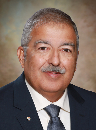 Ben Cantu, suit and tie, brown backdrop