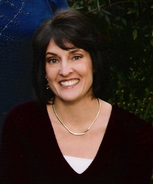 Ida Clair short dark hair black and white blouse