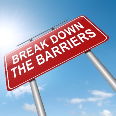 A cartoon traffic sign saying: "Break Down the Barriers"