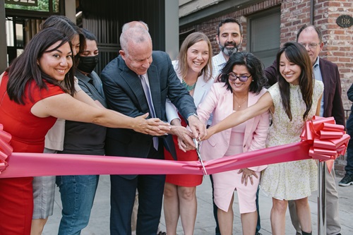 Photo of Ana Lasso and other high-level executives at grand opening