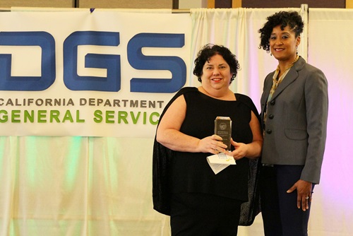 Joan Dutra accepts the most improved small business participation award for First 5 California for the large agency category