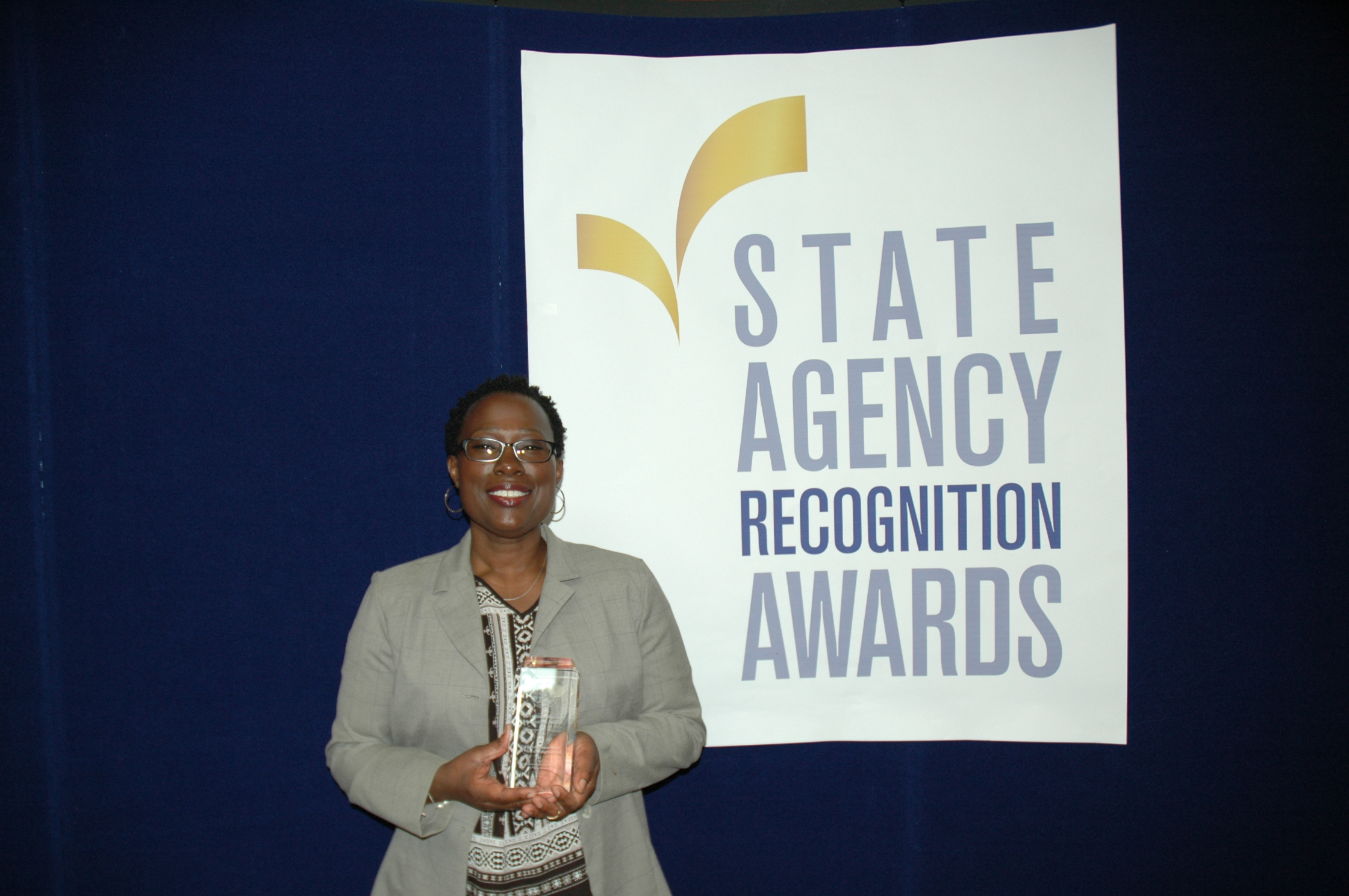 Pamela Sherron accepts the most improved DVBE participation award for the California Department of food and agriculture for the large agency category