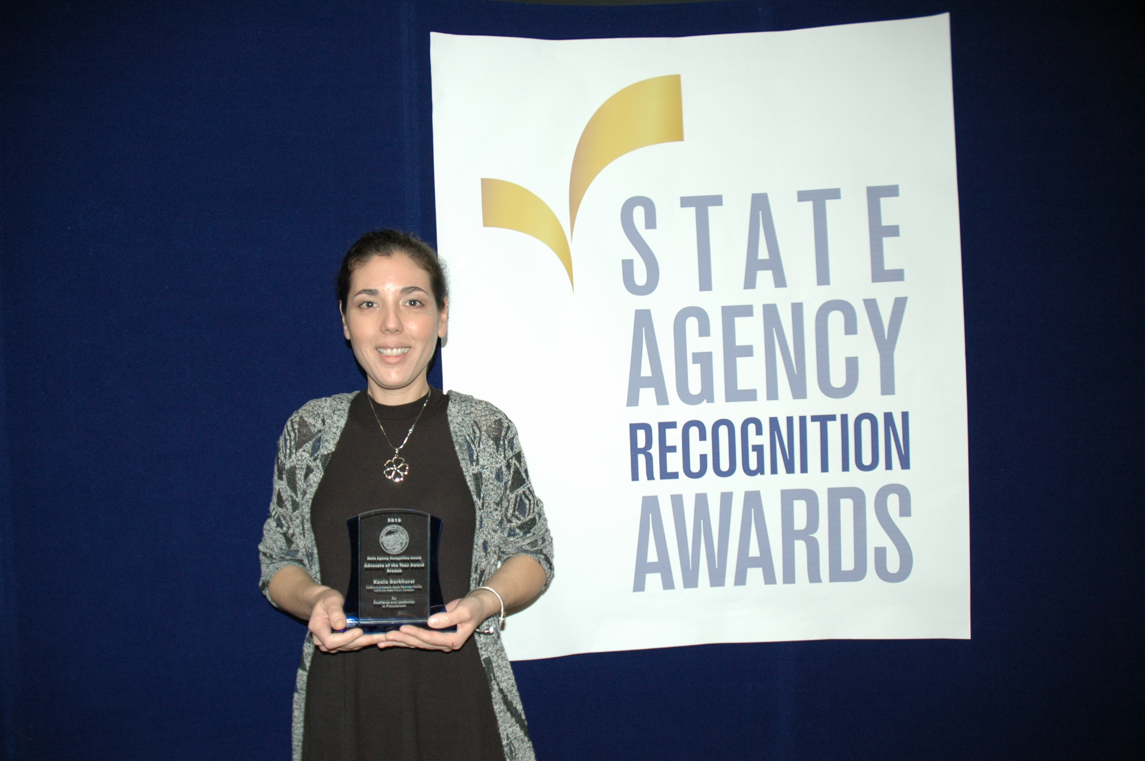 Keala Barkhurst, California Department of Corrections and Rehabilitation - California Substance abuse treatment facility, California State Prison, Corcoran, accepts the Bronze Advocate of the year award.