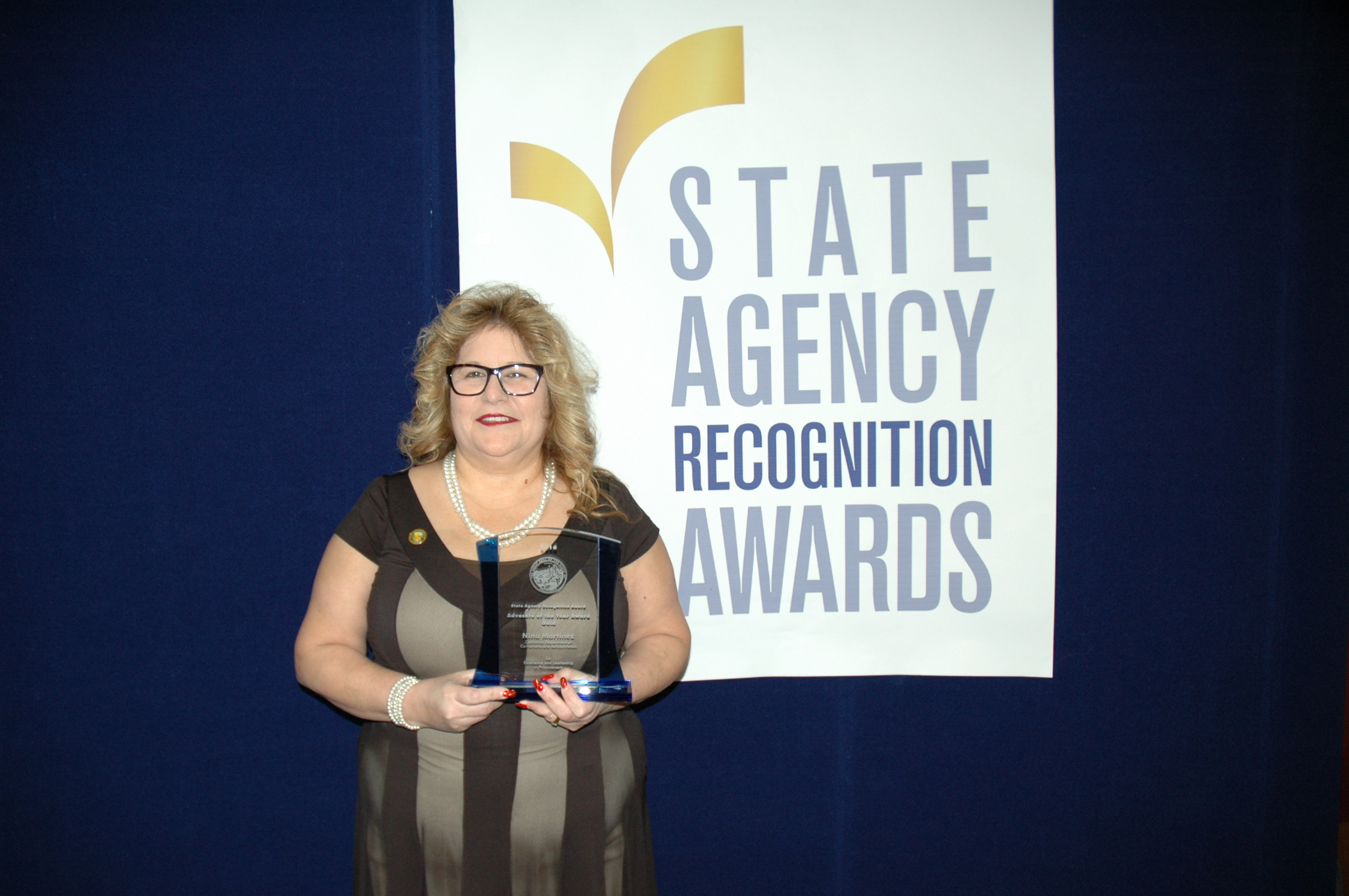 Nina Martinez, California department of corrections and rehabilitation, accepts the Gold advocate of the year award