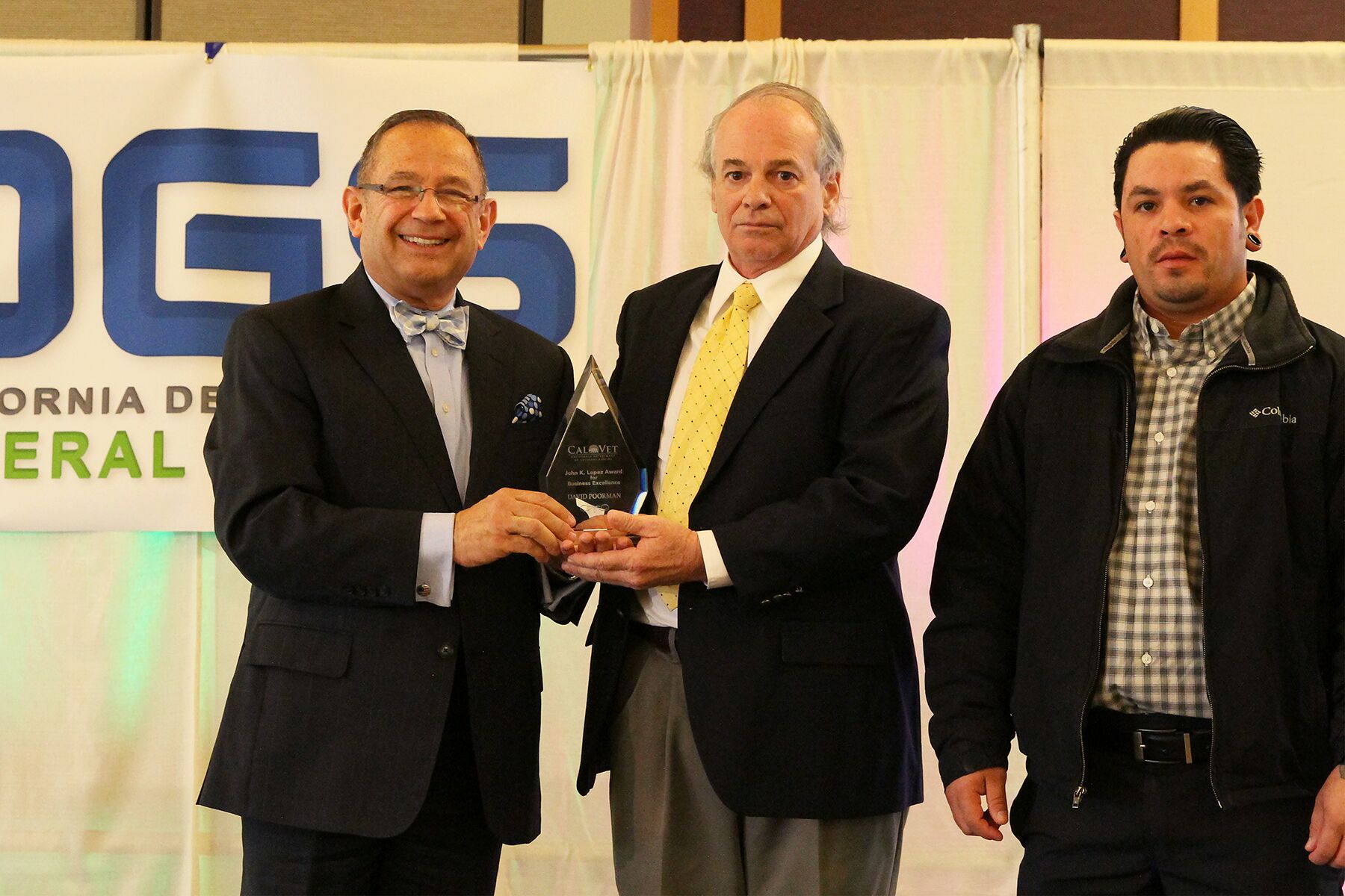 Steve DiPressi and Eddie Barajas from IECLT, Inc. accept the John K. Lopez award for Business excellence