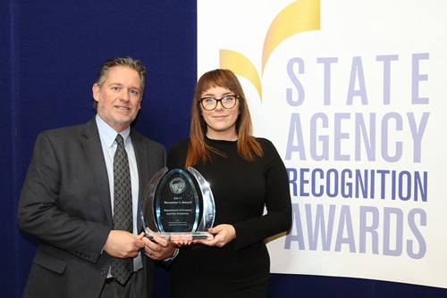 Tony Favro and McKensie Pimley accepted the Governor's Award for the Department of Forestry and Fire Protection