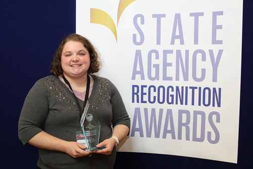 Rebecca Mark accepts the Silver Agency of the Year award for the office of statewide health planning and development
