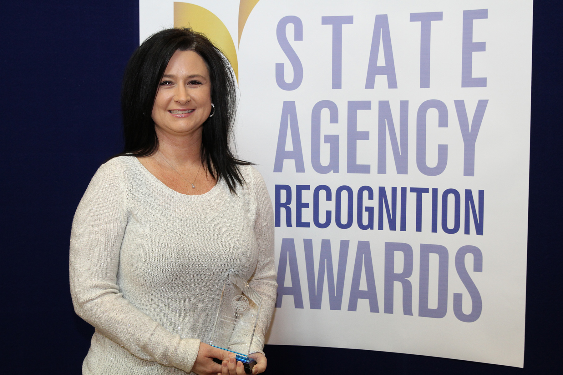 Shantill Castro, California Department of Corrections and Rehabilitation, Wasco State Prison, accepts the silver advocate of the year award