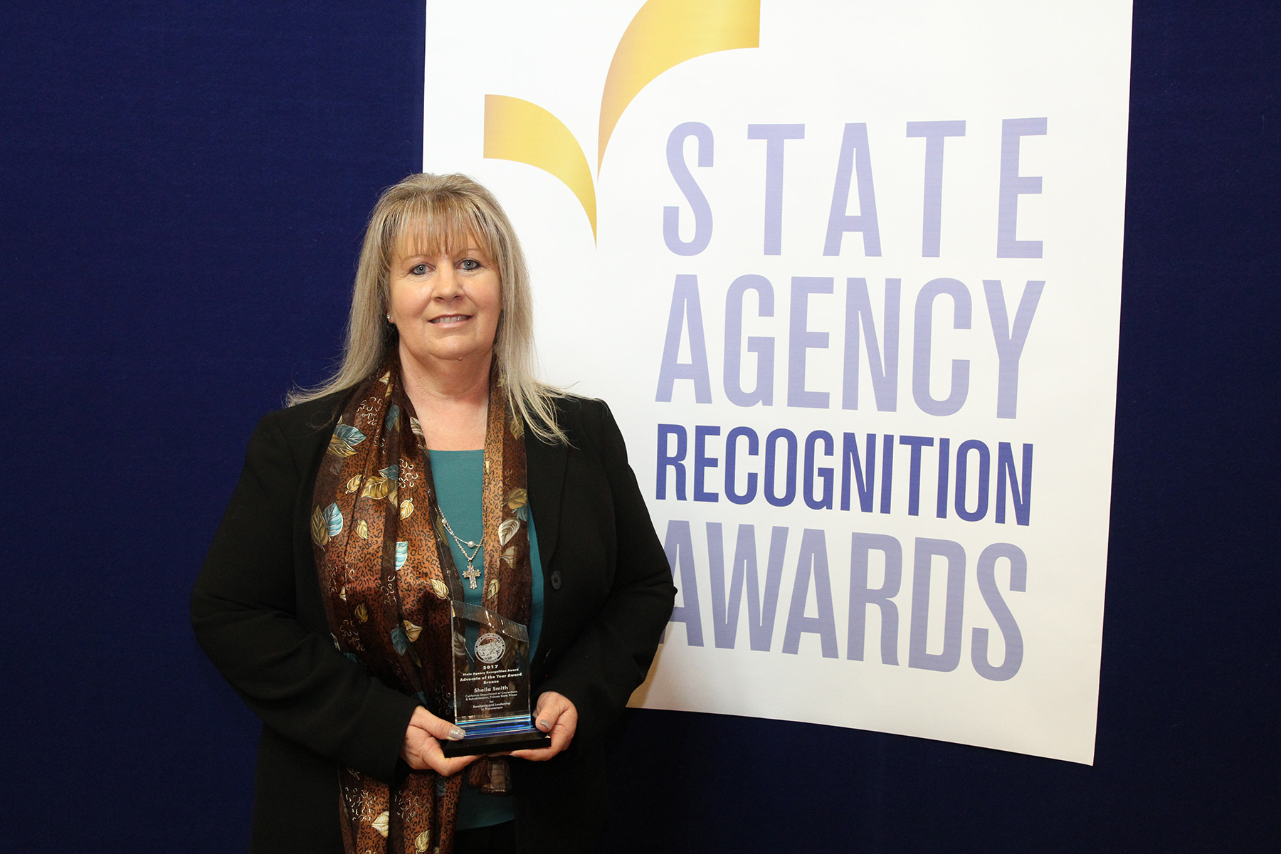 Sheila Smith, California department of corrections and rehabilitation, folsom state prison, accepts the bronze advocate of the year award