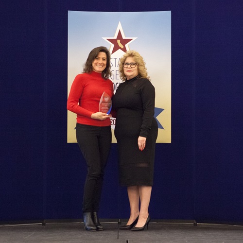 The California Public Utilities Commission accepts the silver agency of the year award.