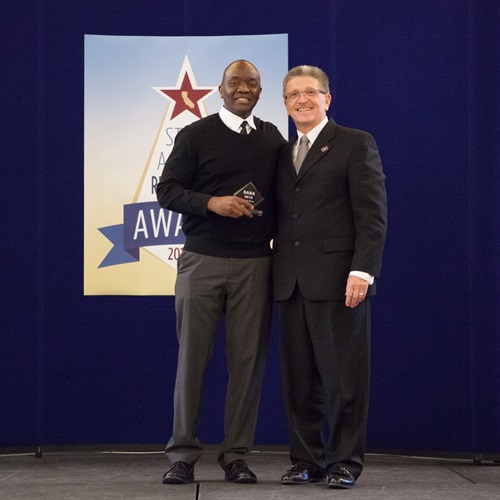 Dickson Owino receives a special recognition.