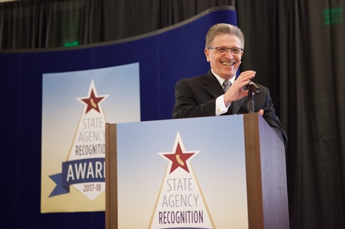 Angel Carrera, Chief, Certification and Outreach Branch, Department of General Services brings the ceremony to a close.