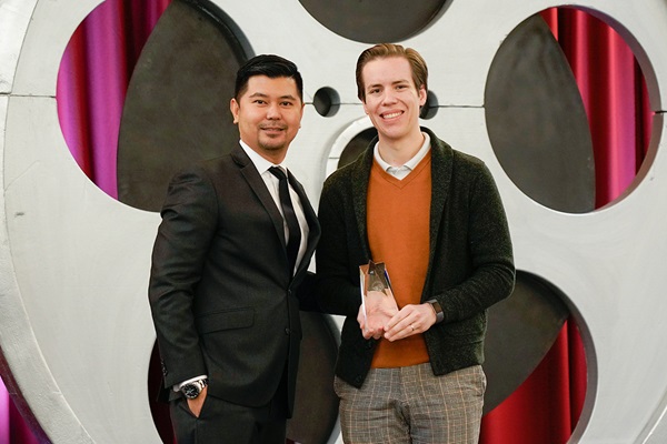 Darvin Manuel, Department of General Services, presents Brandon Chastain, Department of Corrections and Rehabilitation - Avenal State Prison, with the Bronze Advocate of the Year Award.