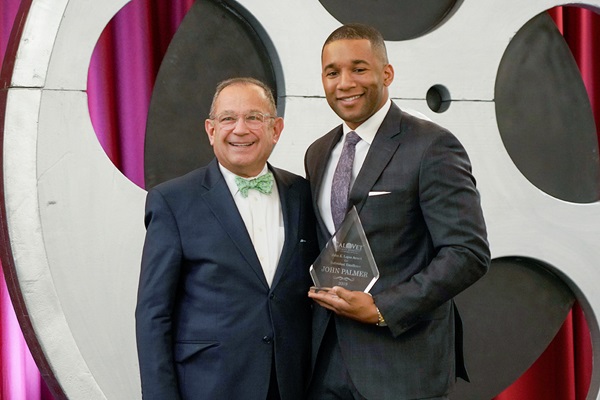 John K Lopez Individual Excellece: Vito Imbasciani, Secretary of the California Department of Veterans Affairs presents John Palmer, CEO of Servexo U.S.A, with the John K. Lopez award for Individual Excellence.