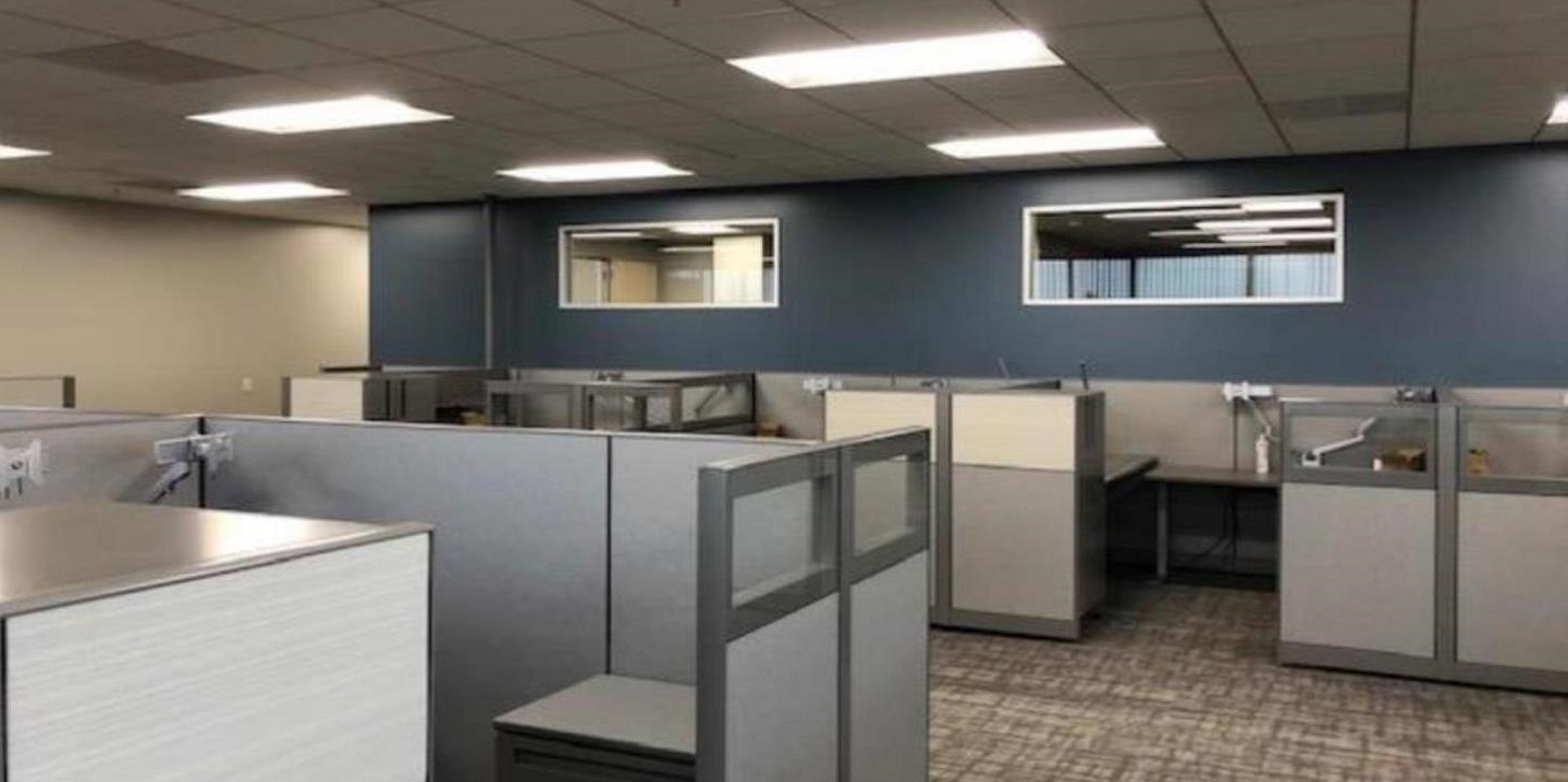 Low partition cubicles in newly leased office building located at  2 MacArthur Place in Santa Ana, CA