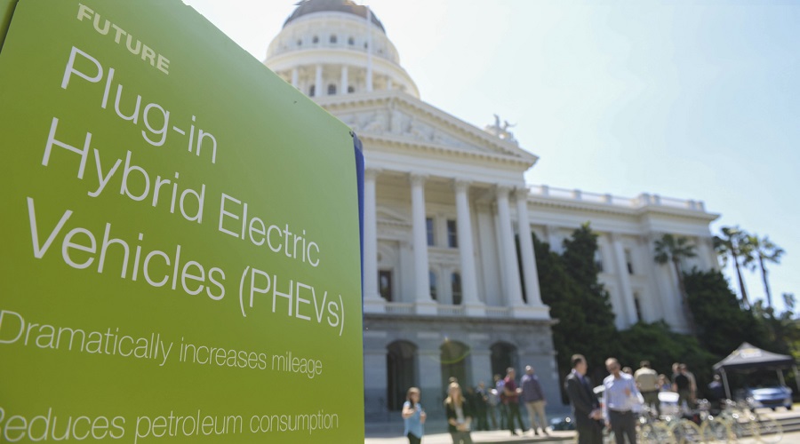 Plug-In Hybrid sign in front of the state Capitol